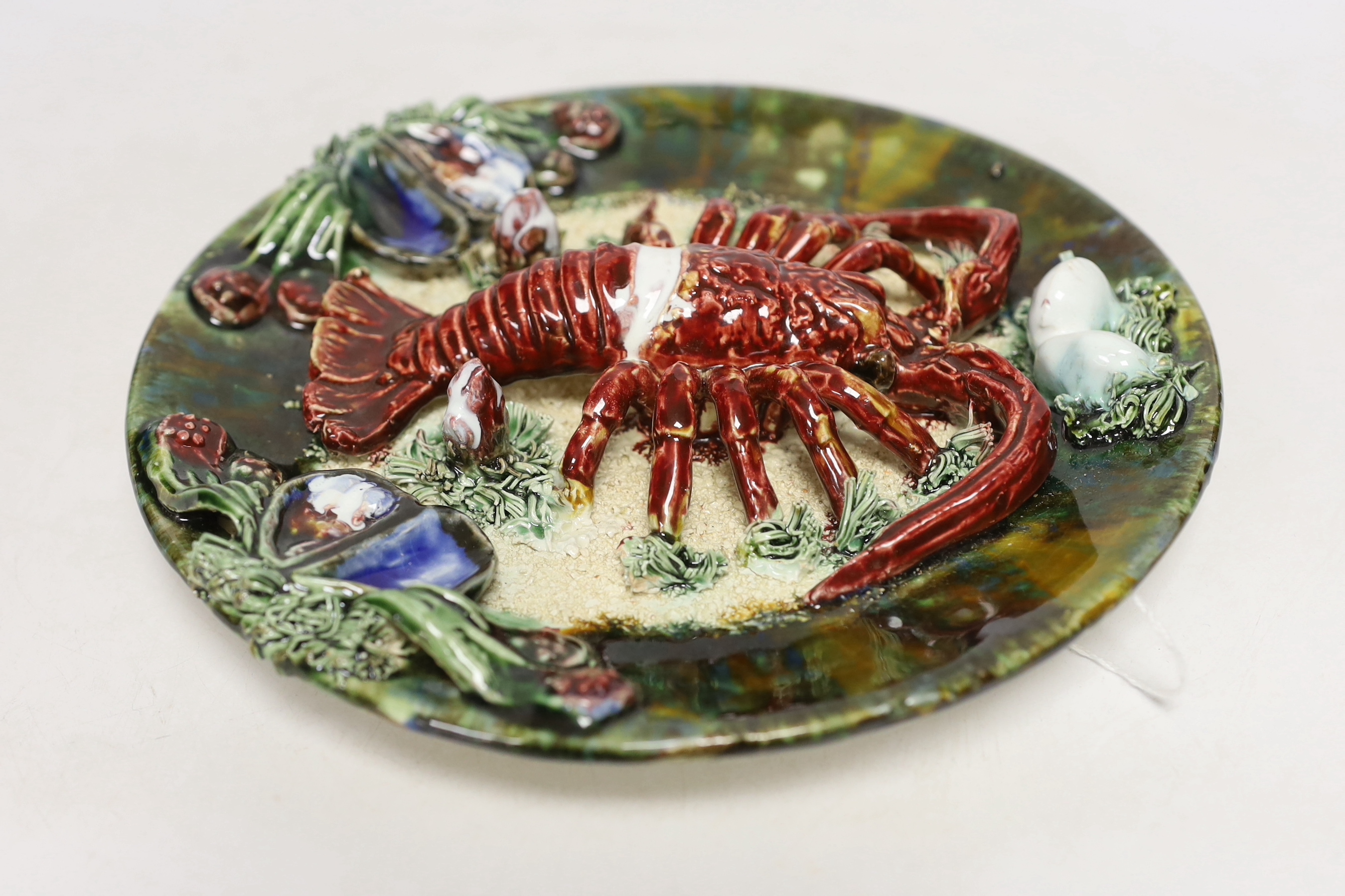A Caldas Da Rainha Pallisy type dish, indistinct stamp to reverse, 23cm